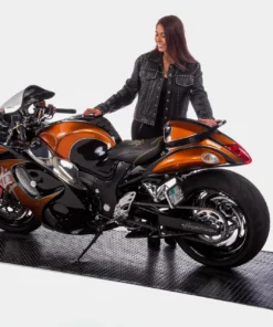 woman with orange street bike on the standard sport motorcycle storage floor